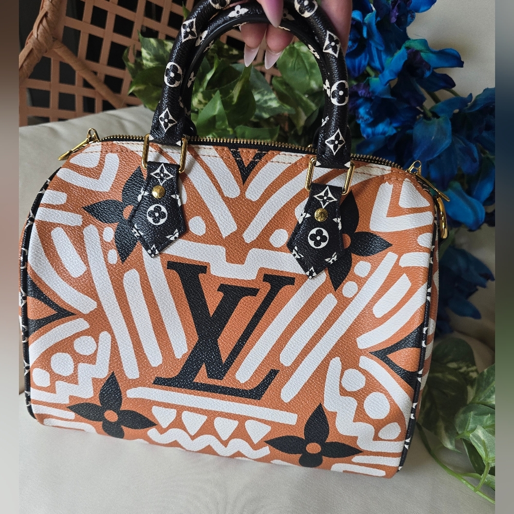 Authentic Louis Vuitton Crafty Speedy Bandouliere 25